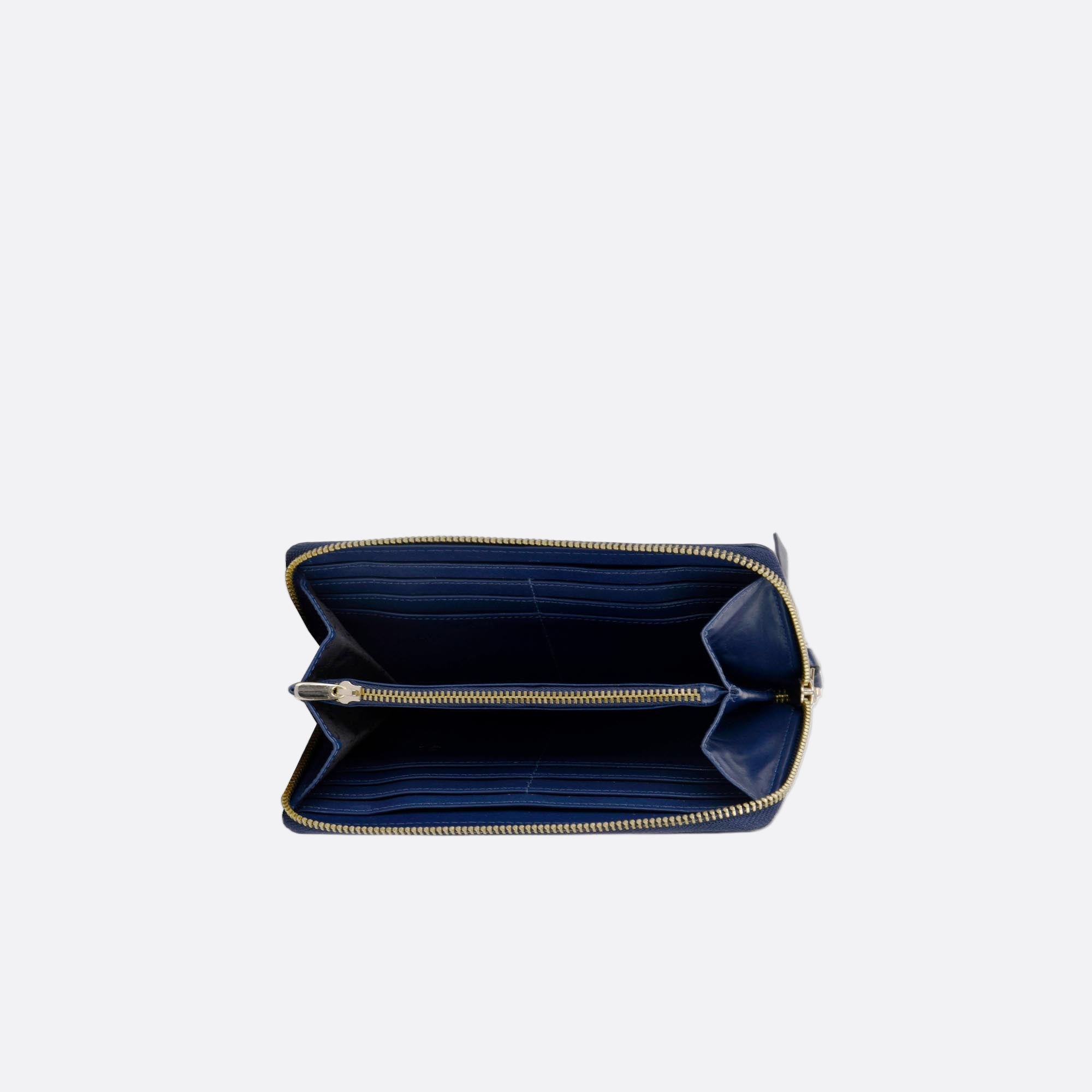 Open ANNA wallet blue showing card slots, coin pocket, and compartments