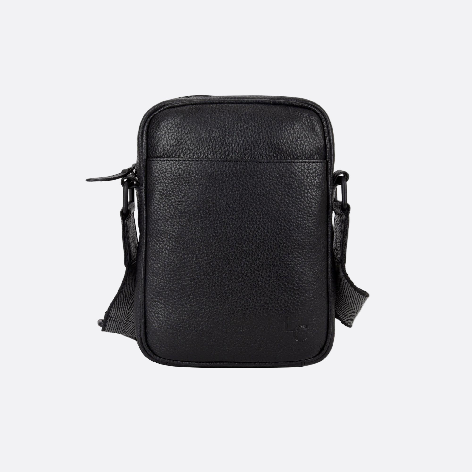 Front view of KAFFE small black leather crossbody bag with zip closure and front slip pocket.
