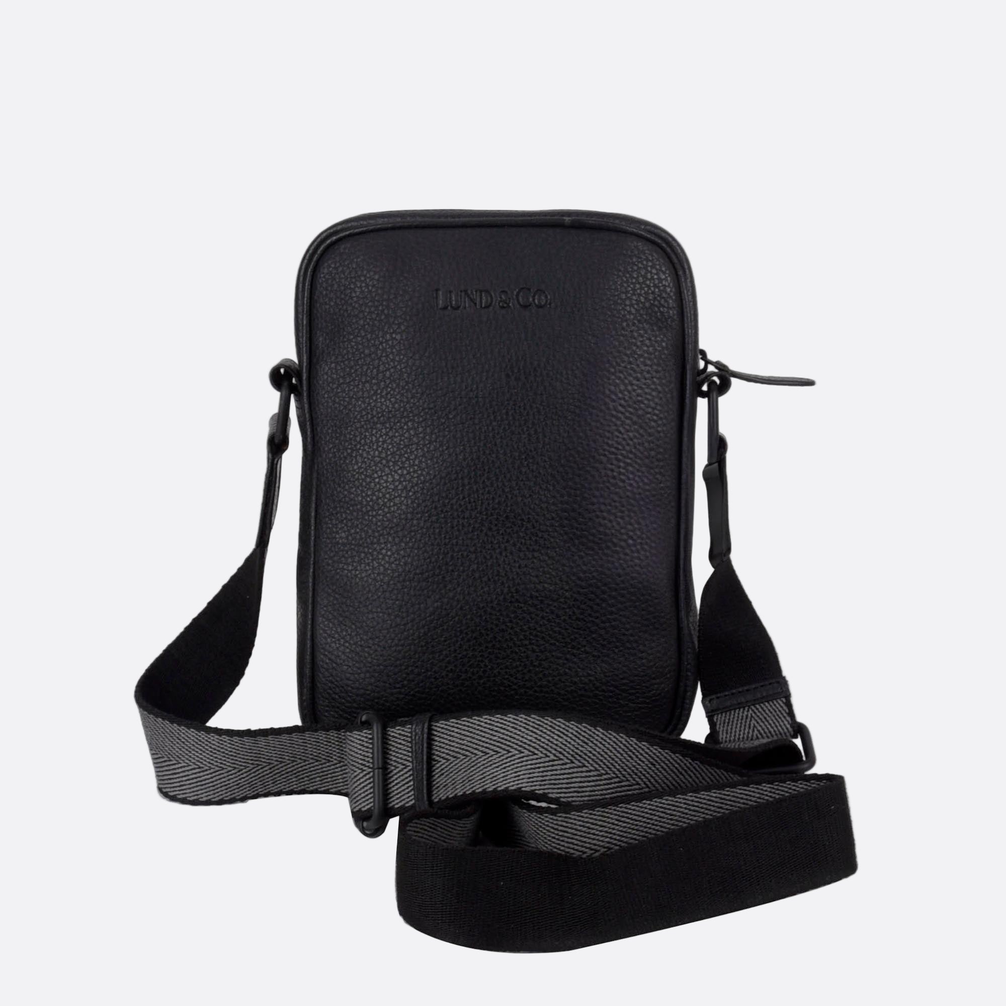 Back view of KAFFE small black leather crossbody bag with zip closure