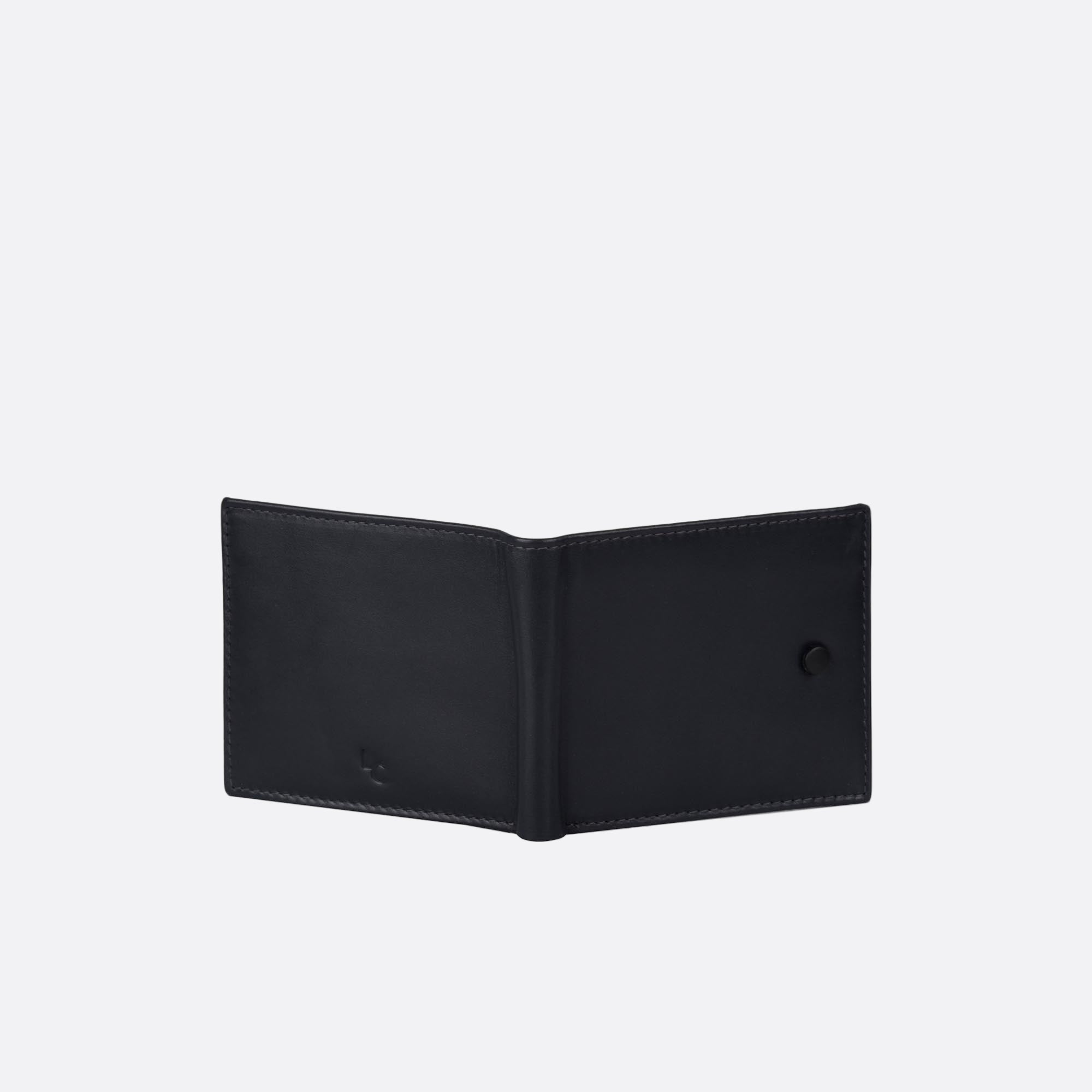 Open back of KNAPP blue leather wallet black button detail