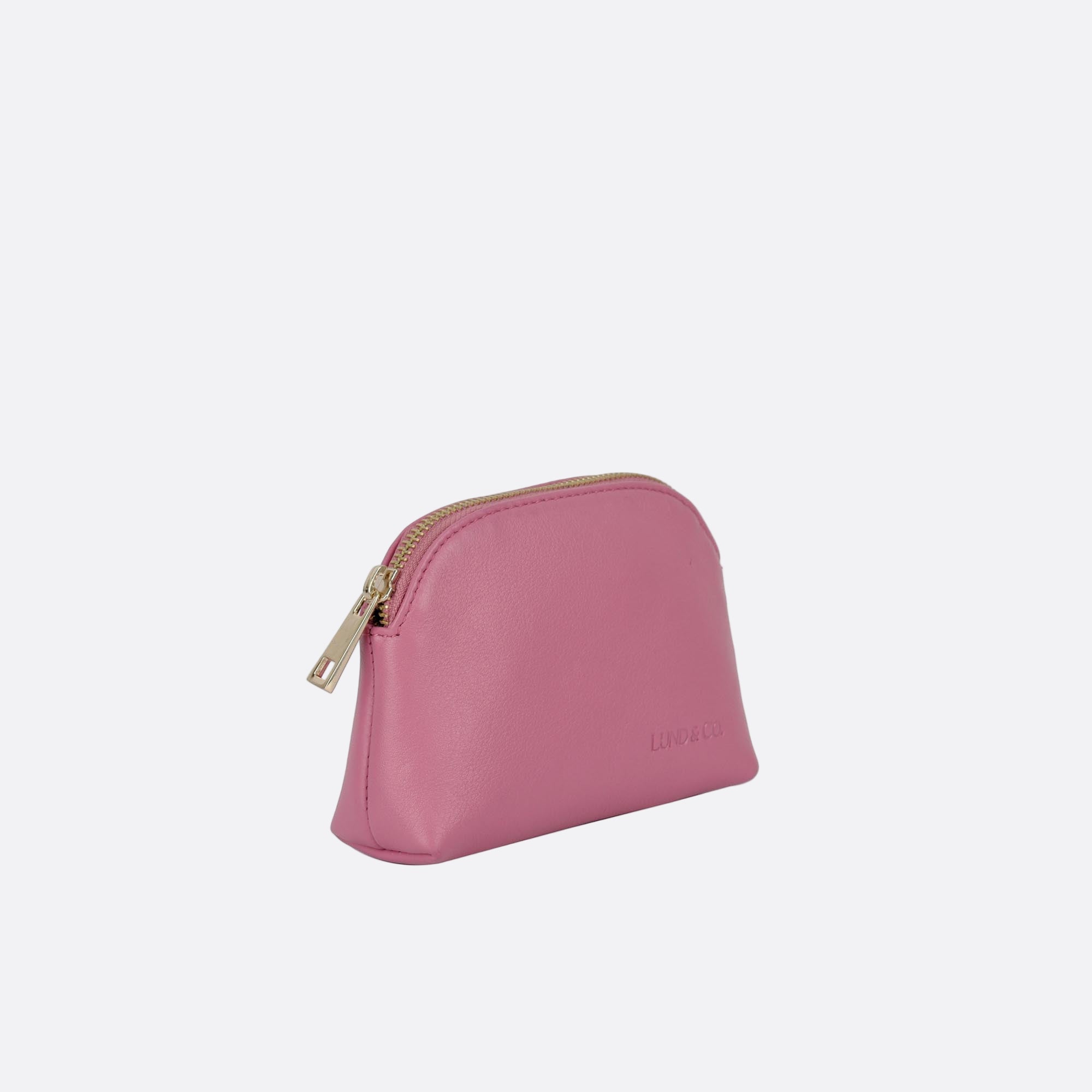 Side angle showing LILLA-L pink leather purse’s structure and stitching detail