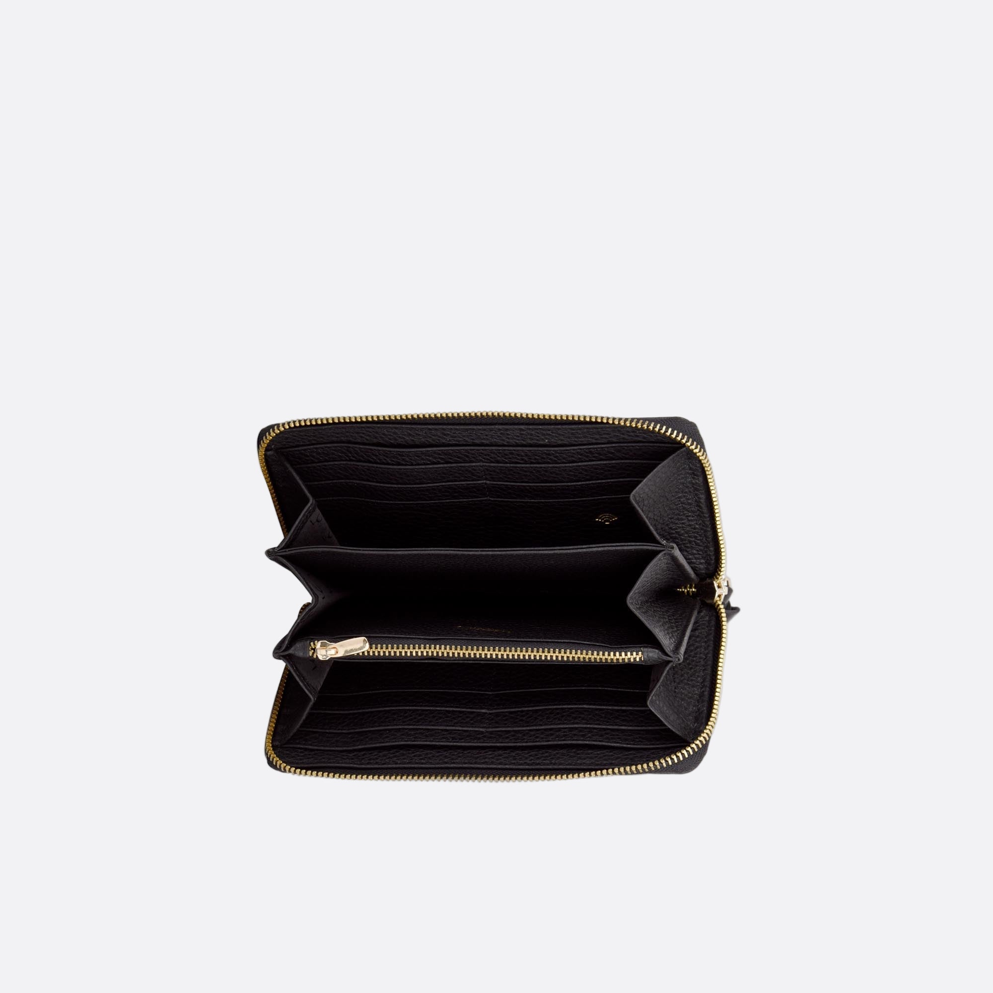 Top-down view of open MYNT large black wallet revealing card slots and compartments