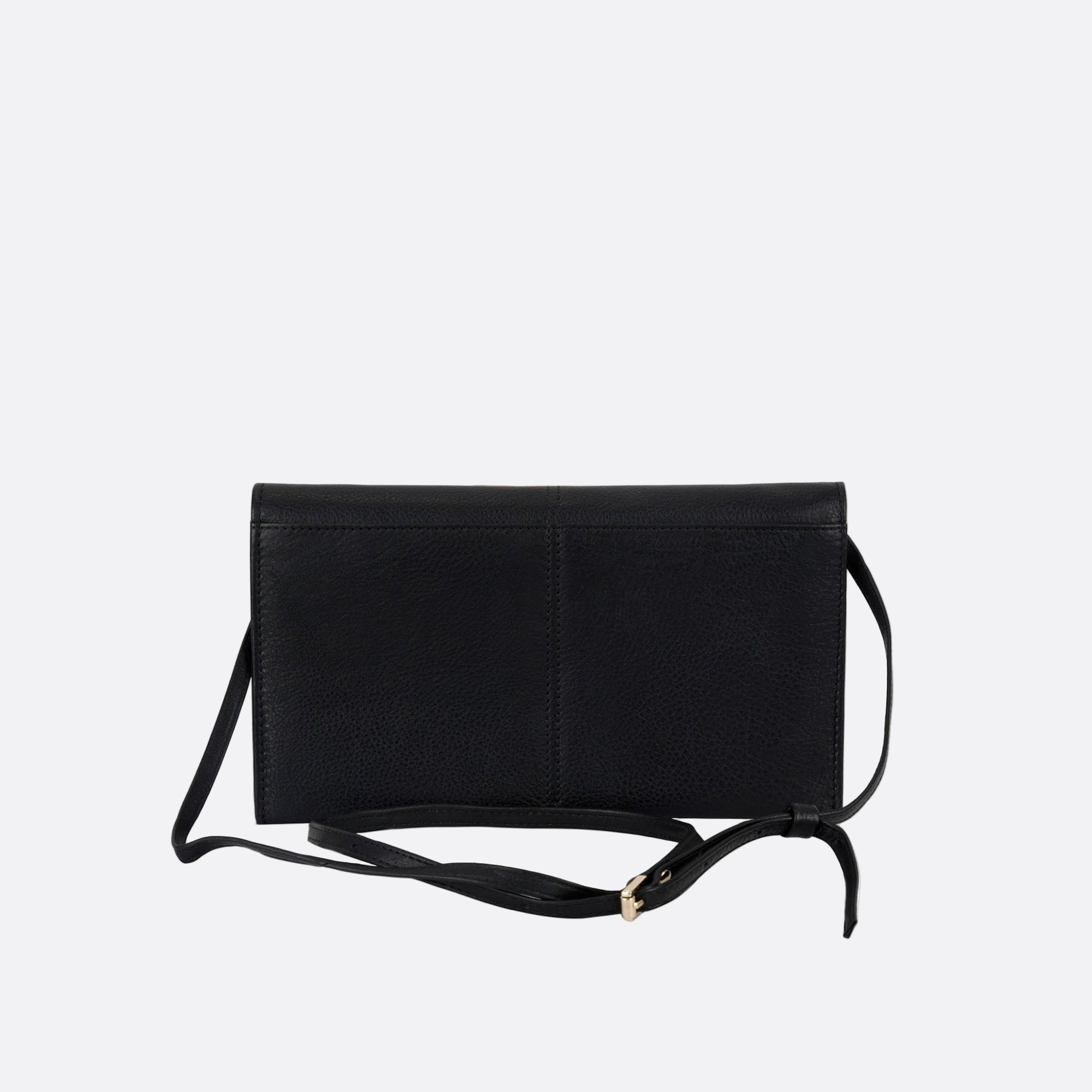 Back view of SOMMARLOV black leather crossbody clutch with slim silhouette, detail stitching and slim removable and adjustable leather strap.