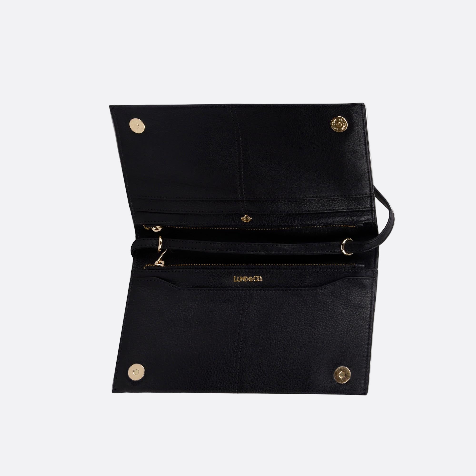 Open view of SOMMARLOV black leather clutch showing internal compartments including card slots, zipped pockets and slip pockets