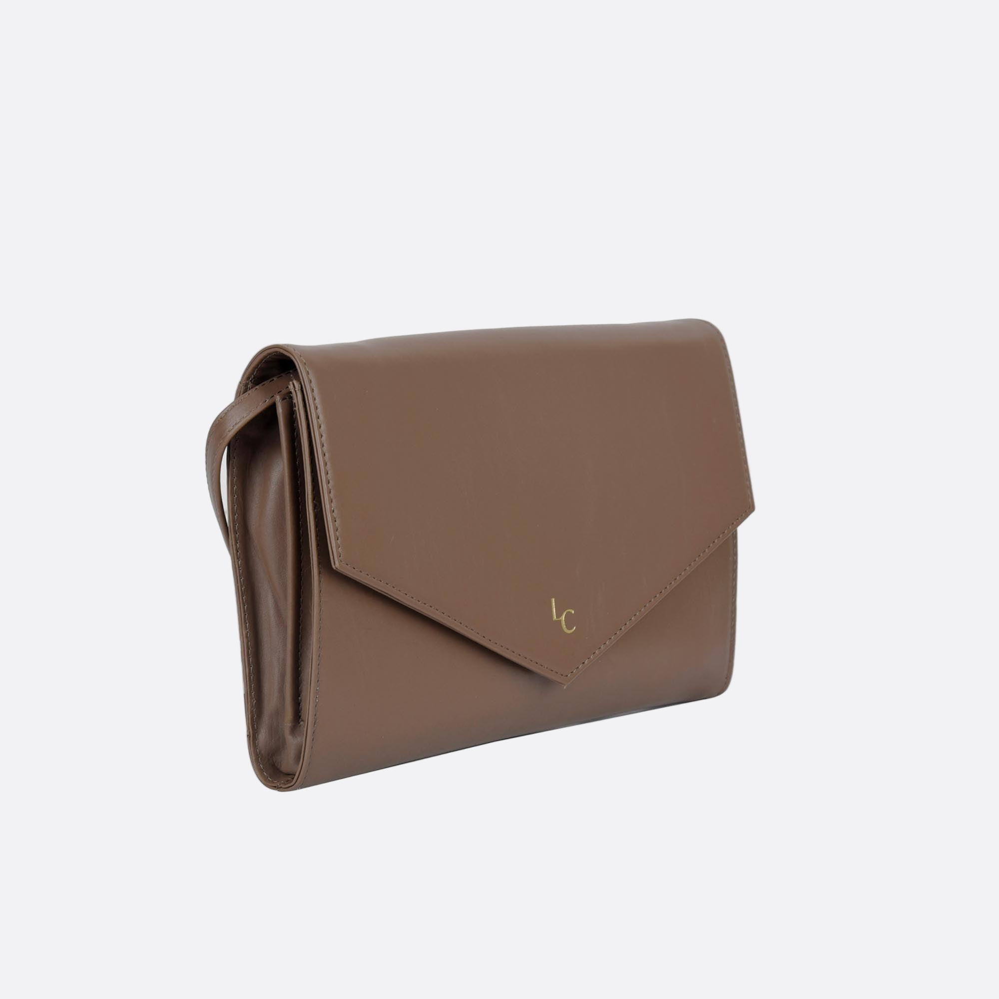 Side view of slim AFTON taupe clutch in soft leather