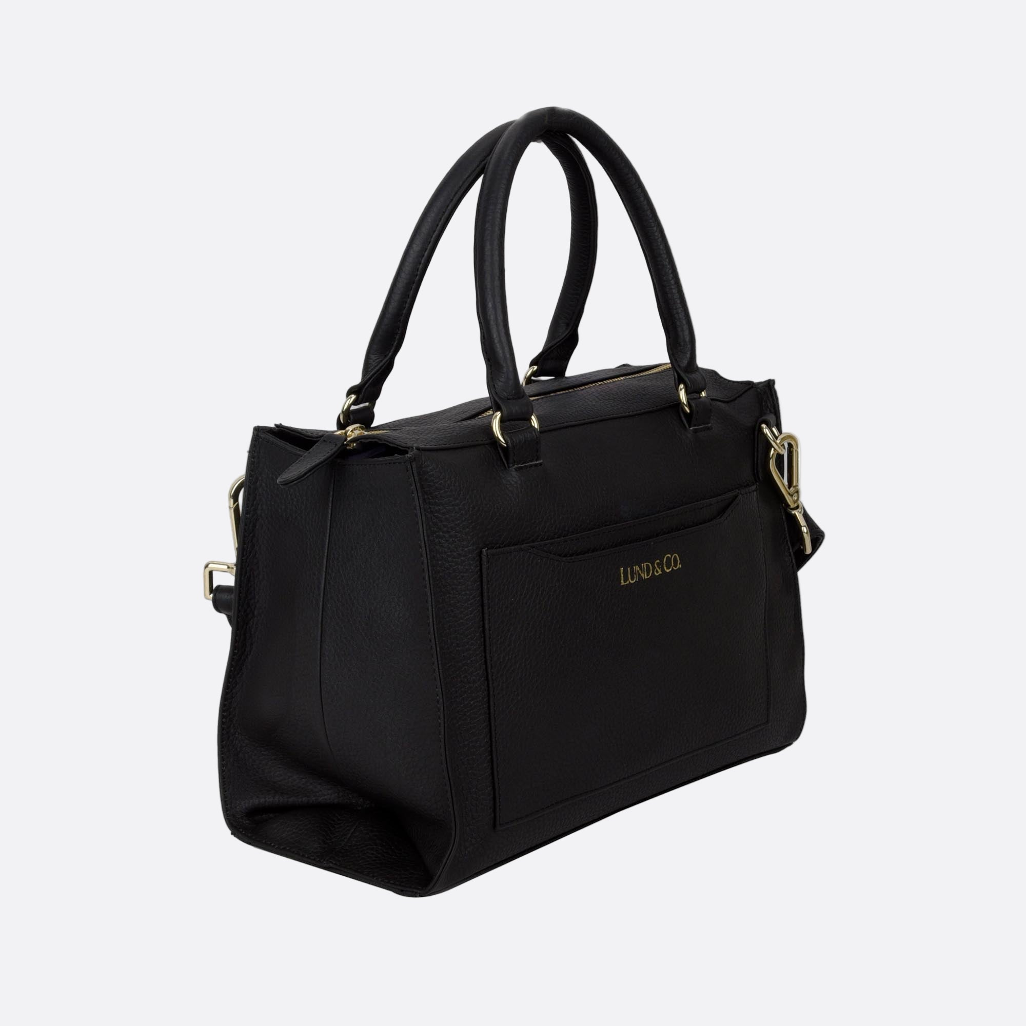Side angle of BJORK black tote showing side tailoring and base depth