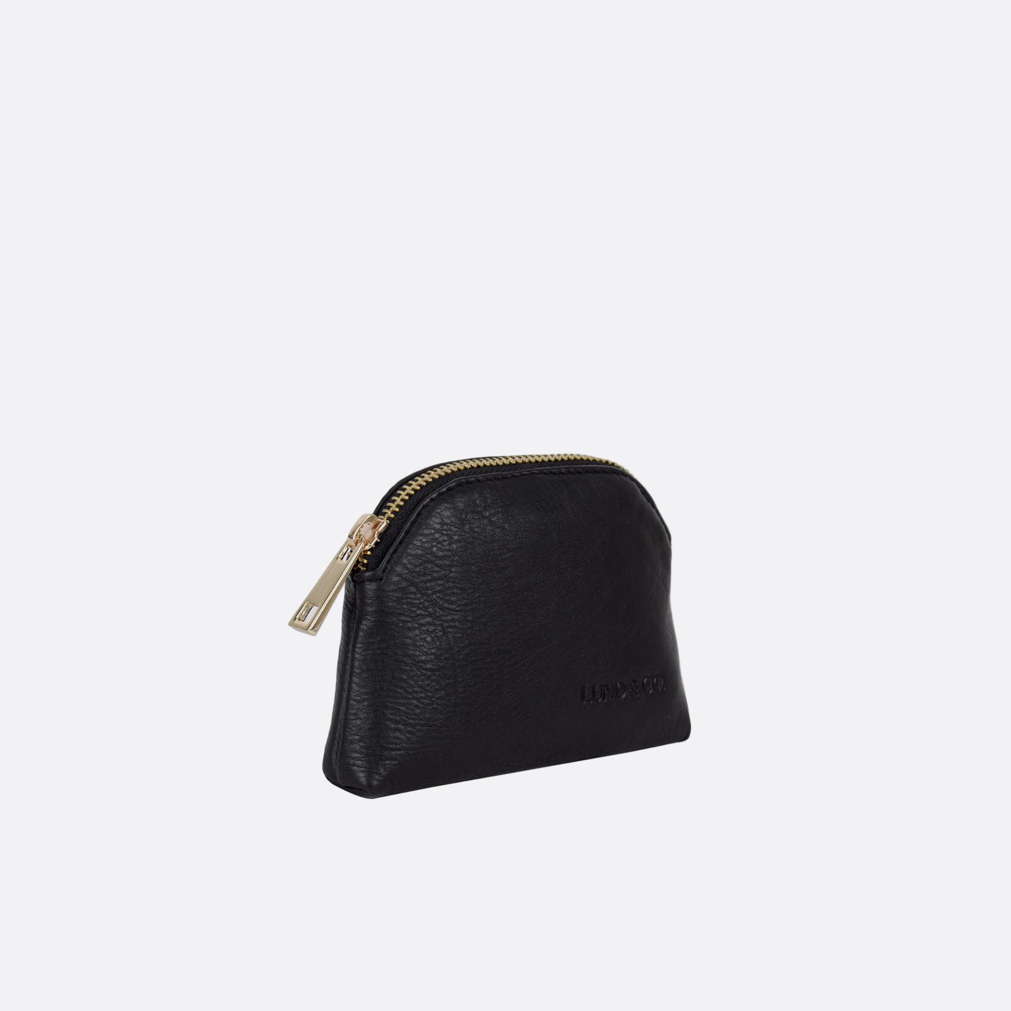 Side angle of LILLA-S black leather dome purse showing slim profile and zip closure