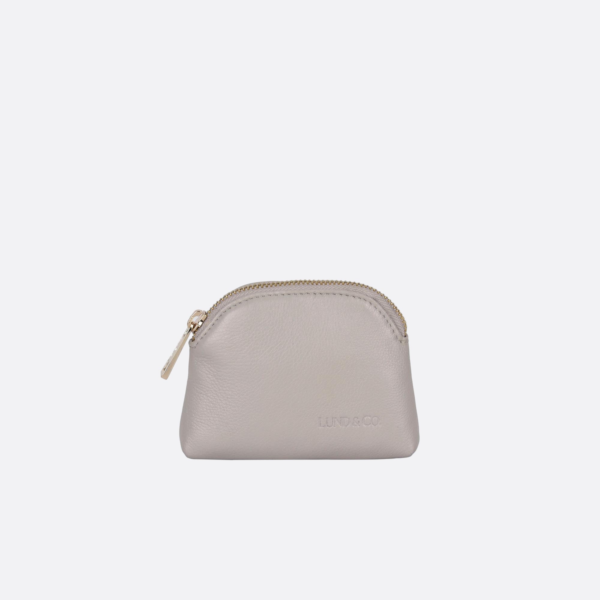 Front view of LILLA-S beige leather dome purse with curved silhouette